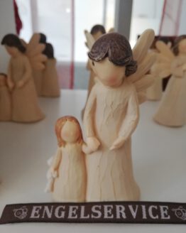 Engel mit Kind an der HAnd